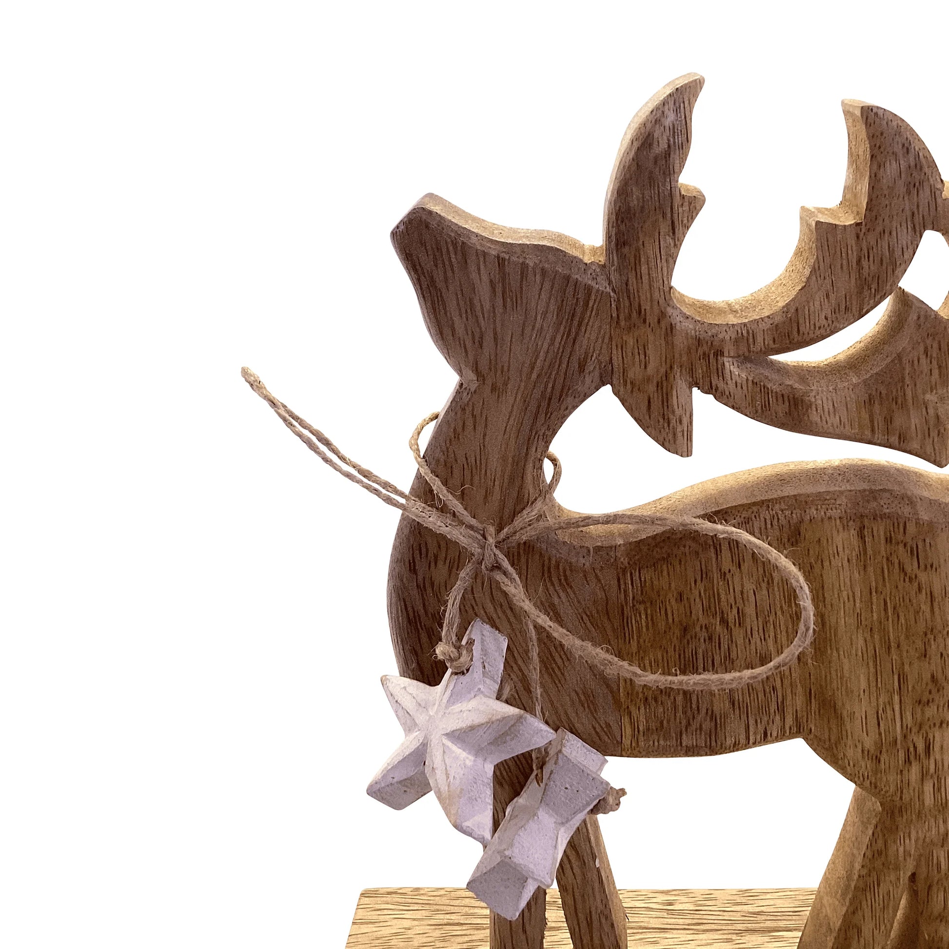 Wooden reindeer ornament with a star-shaped decoration on a white background